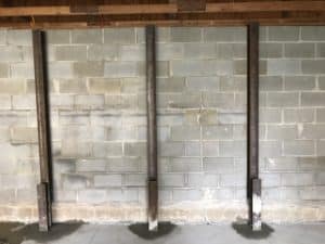 Bowed walls with beams